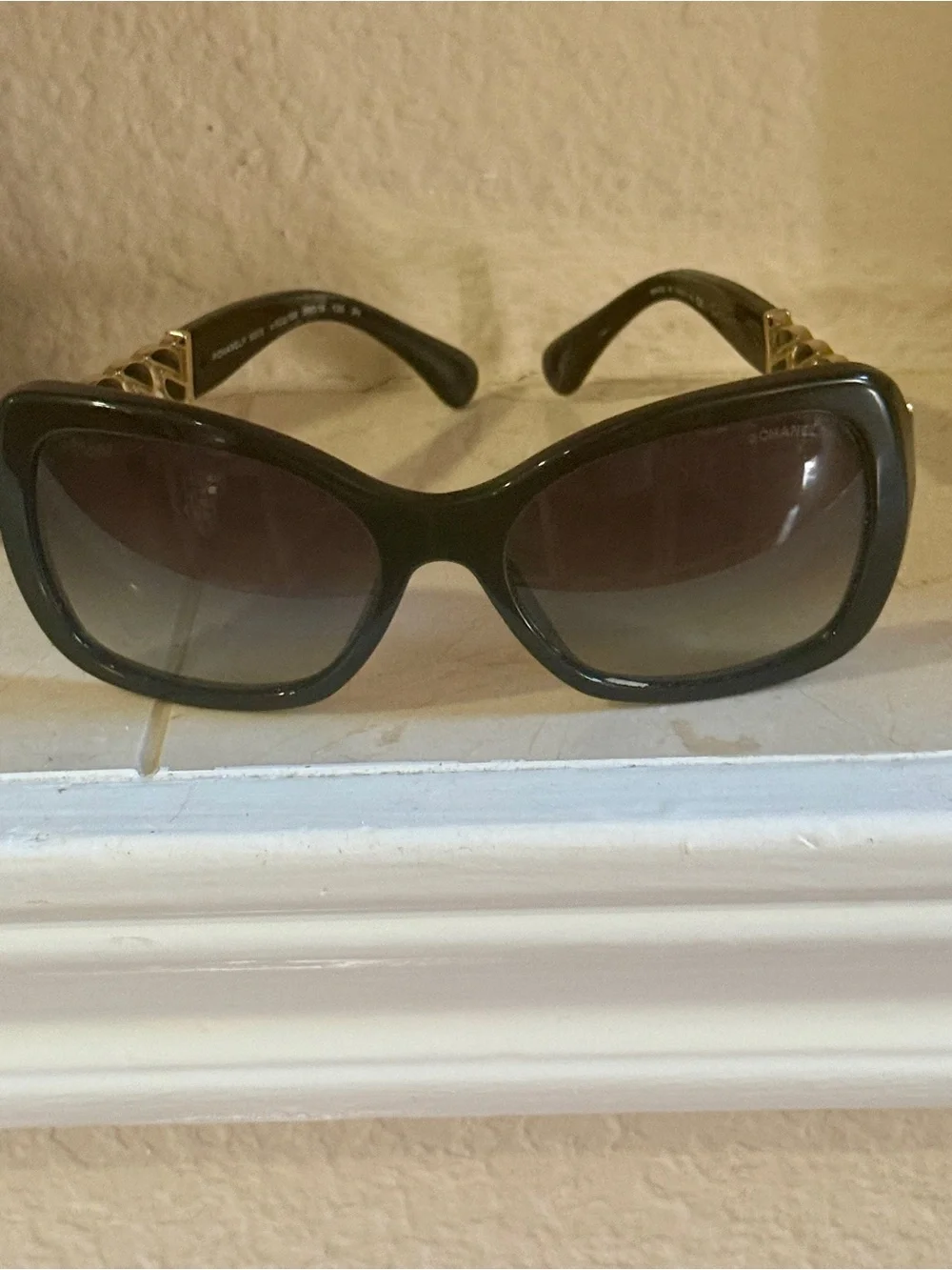 CHANEL Black Sunglasses with Gold Chain Temple Accents